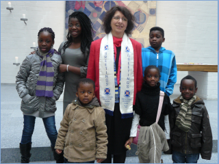 Rev. Kreider with some members of our Children's Service.
